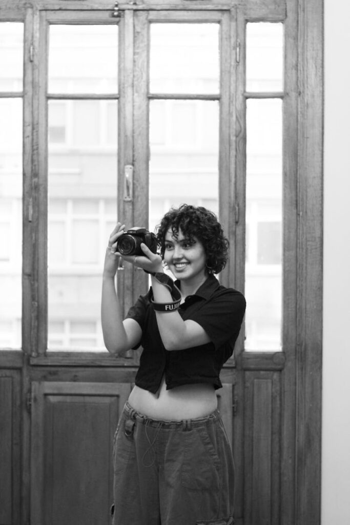 smiling brunette with camera