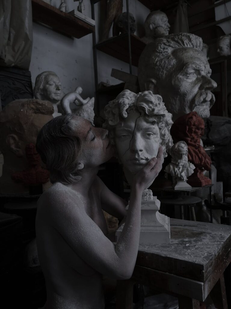 living sculpture in workshop with bust